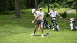 HJGT Junior Golfer Teeing Off
