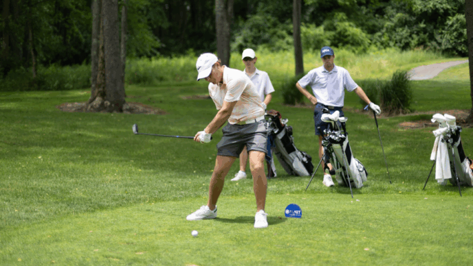 HJGT Junior Golfer Teeing Off
