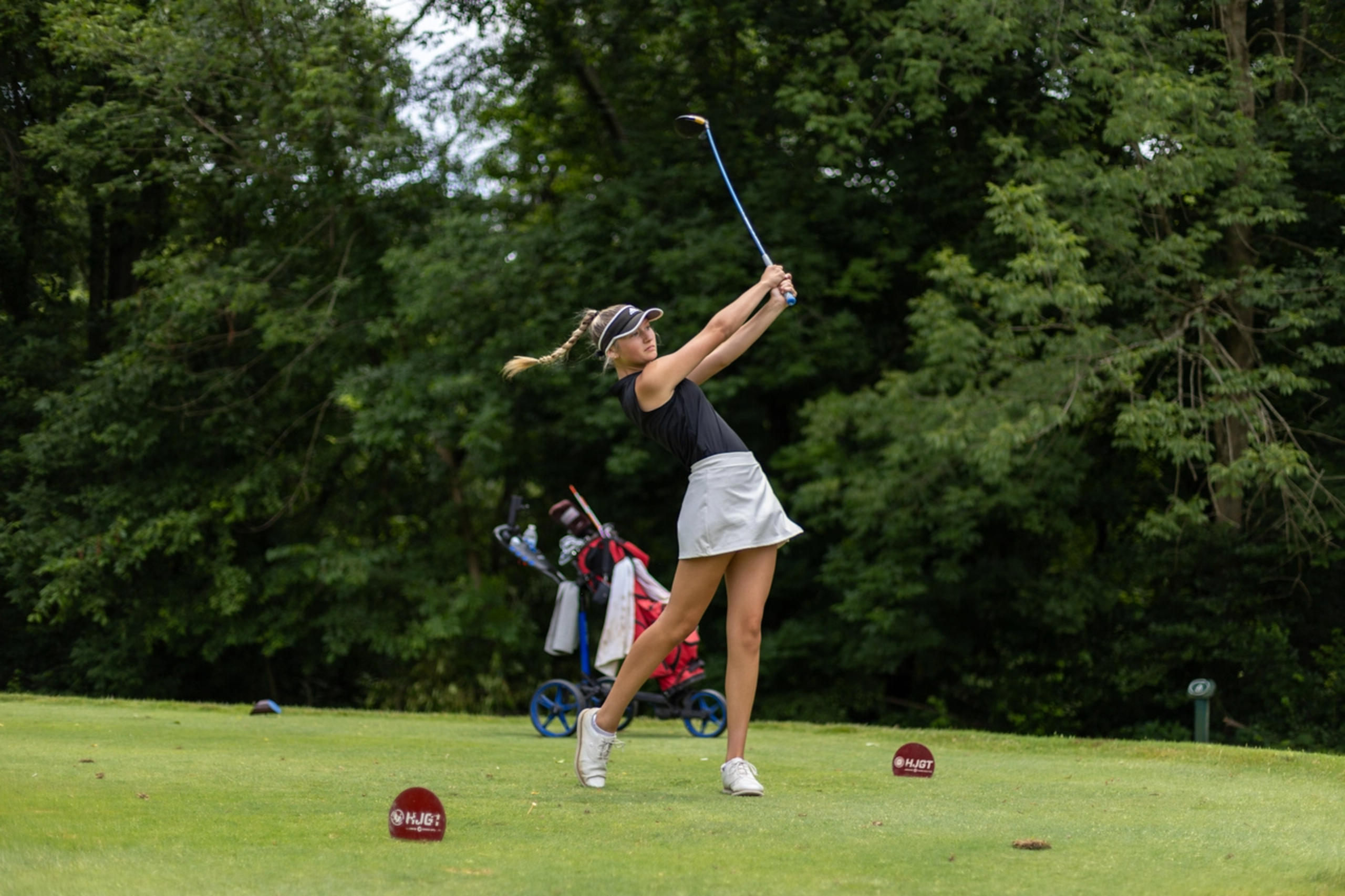 Woman Teeing Off Open